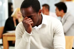 African American businessman tired in office-1