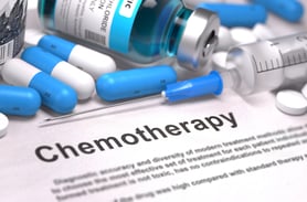 Chemotherapy - Printed with Blurred Text. On Background of Medicaments Composition - Blue Pills, Injections and Syringe.