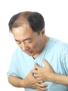 Man with heart pain. Contact our New York disability Attorneys