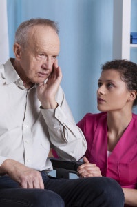 Elderly man and nurse disability lawyers in New York pain cases with elderly