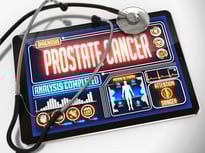Medical Tablet with the Diagnosis of Prostate Cancer on the Display and a Black Stethoscope on White Background.