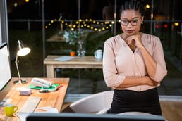 Businesswoman looking at computer screen in the office