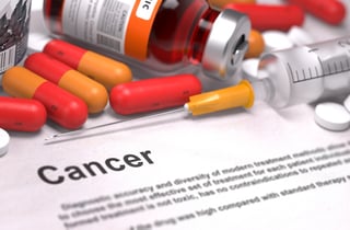 Cancer Diagnosis. Medical Concept with Composition of Medicaments - Red Pills, Injections and Syringe. Selective Focus. 3D Render..jpeg