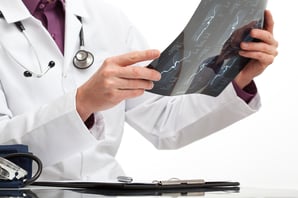 Doctor is making a diagnosis for a patient in medical office-2
