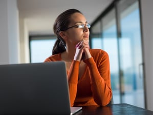 young business woman working on laptop computer at modern home office