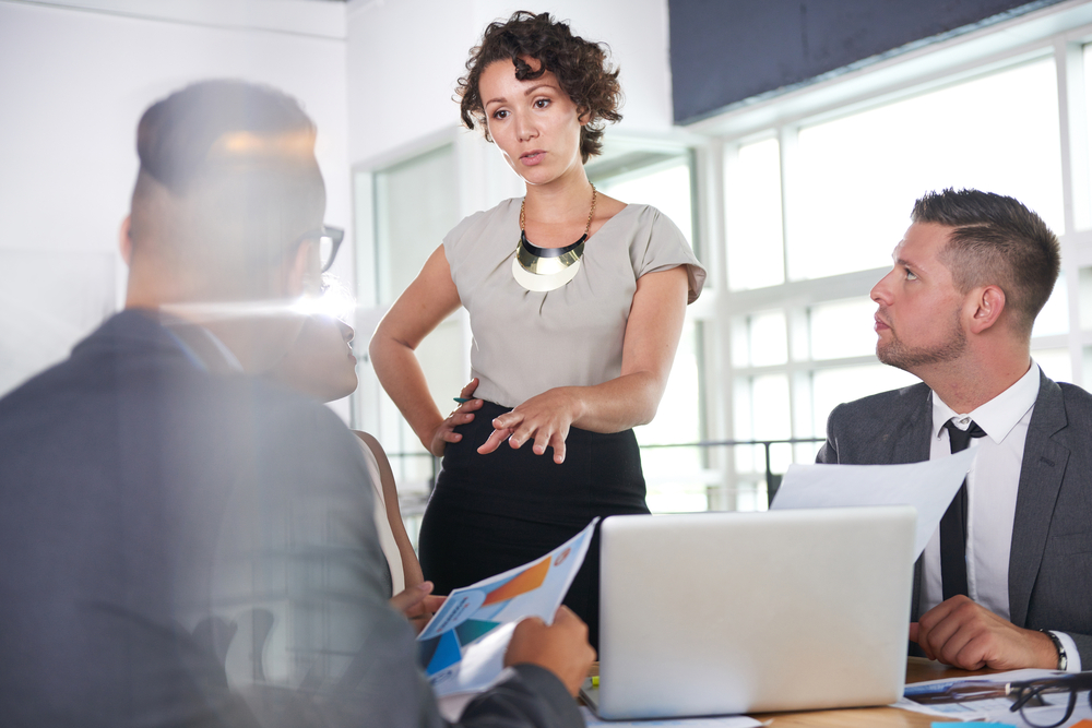 team of successful business people having a meeting in executive sunlit office-2
